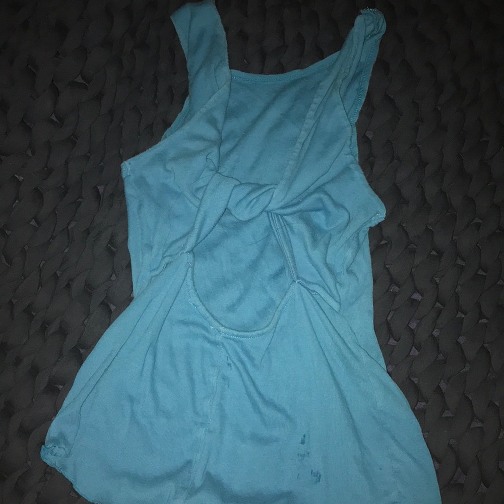Free People blue top size small with a twisted back detail